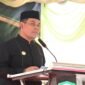 Bupati Aceh Besar H Muharram Idris (Syech Muharram) menyampaikan sambutannya pada penyambutan tim penilai lomba gampong di Beuradeun, Kecamatan Peukan Bada, Kabupaten Aceh Besar, Jumat (20/6/2025) pagi. Foto: Dok. MC Aceh Besar