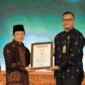 Menag menerima Piagam Rekor MURI. dok. Kemenag RI