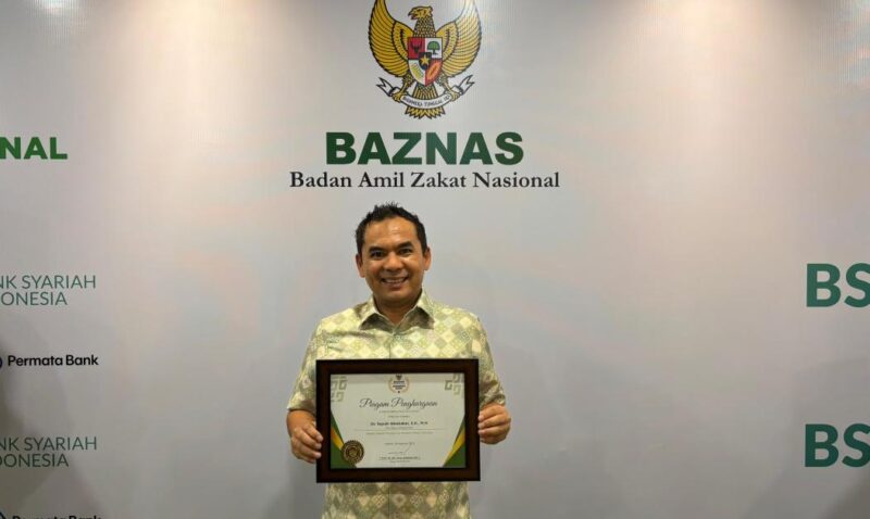Wali Kota Lhokseumawe, Sayuti Abubakar, S.H., M.H., meraih penghargaan pada ajang BAZNAS Award 2025 yang digelar di Hotel Mercure Ancol, Jakarta, Kamis (28/8/2025). Dok. Pemko Lhokseumawe