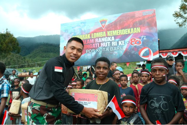 Semangat Nasionalisme Berkibar di Perbatasan Papua Tengah.(Foto:Dok.Satgas Yonif 112/DJ)