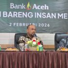 Direktur Utama Bank Aceh Syariah, Fadil, saat menyampaikan sambutan dalam acara coffee morning bersama insan pers di Banda Aceh, Senin (2/2/2026). Foto: Dok. Istimewa