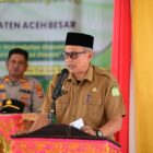 Asisten III Sekdakab Aceh Besar Abdullah, S.Sos, membuka Musrenbang RKPD 2027 Kecamatan Kuta Cot Glie di Gedung UDKP, Senin (9/2/2026). Foto: Dok. MC Aceh Besar