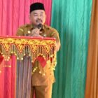 Asisten II Sekdakab Aceh Besar M. Ali, S.Sos., M.Si membuka Musrenbang RKPD 2027 Kecamatan Simpang Tiga di Gedung UDKP, Senin (9/2/2026). Foto: Dok. MC Aceh Besar