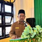 Kepala Dinas Pendidikan Dayah Aceh Besar Abubakar, S.Ag., mewakili Bupati Aceh Besar saat membuka Musrenbang Kecamatan Lhoong di UDKP Lhoong, Senin (9/2/2026). Foto: Dok. MC Aceh Besar