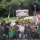 Ket foto : Dandim 0119/BM Letkol Inf Ahmad Fauzi didampingi unsur Forkopimcam meresmikan Jembatan Aramco di Desa Batin Baru.(Dok/Ist)