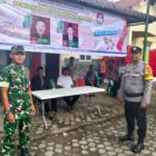 Ket foto : Personel TNI-Polri melaksanakan pengamanan di salah satu TPS dalam rangka Pilkades serentak di Kecamatan Timang Gajah.(Dok/Ist)