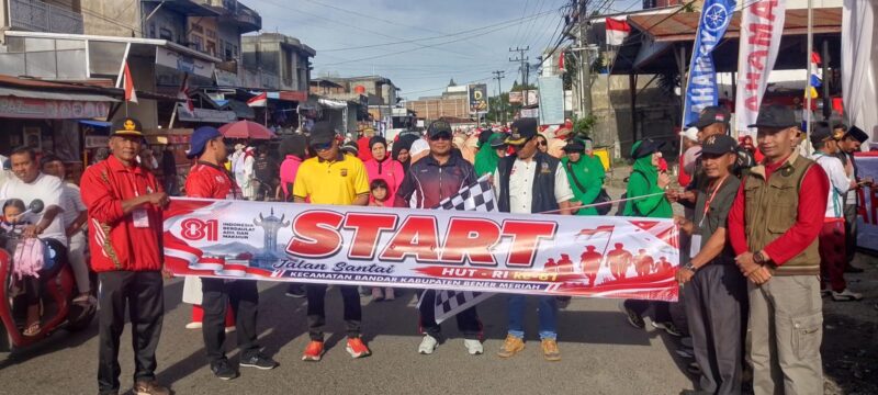 Ket foto: Danramil 01/Bandar Kapten Inf Arianto bersama unsur Forkopimcam dan peserta mengikuti pelepasan jalan santai dalam rangka memeriahkan HUT Kemerdekaan RI ke-81 di Kecamatan Bandar, Kabupaten Bener Meriah, Minggu (16/8/2026).(Dok:Ist)