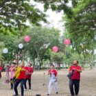 Jajaran Diskominfotik Kota Banda Aceh bersama DWP dan mahasiswa magang mengikuti berbagai perlombaan dalam rangka memeriahkan HUT ke-81 Kemerdekaan RI di Taman Bustanussalatin, Banda Aceh, Kamis (13/8/2026). Foto: Dok. Diskominfo Kota Banda Aceh