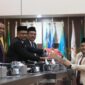 Plt. Sekda Aceh, Taufik, ST, M.Si, saat menghadiri Rapat Paripurna DPRA dengan agenda 