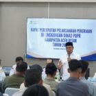 Bupati Aceh Besar Muharram Idris menyampaikan sambutan sekaligus memimpin Rapat Percepatan Pelaksanaan Kegiatan Tahun Anggaran (TA) 2026 di lingkungan Dinas PUPR Kabupaten Aceh Besar di Kota Jantho, Rabu (26/8/2026). Foto: Dok. MC Aceh Besar