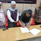 Penandatanganan Letter of Intent (LoI) antara pelaku UMKM dan Penanam Modal Dalam Negeri (PMDN) dalam kegiatan Perintis Berdaya Connect Aceh Business Matching di Ballroom Bapelkes, Banda Aceh, Kamis (27/8/2026). Foto: Dok. Diskominfo Kota Banda Aceh