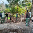 TNI dan masyarakat bergotong royong mempercepat pembangunan Jembatan Gantung Perintis di Kecamatan Ketambe, Aceh Tenggara, Jumat (11/9/2026). Foto: Dok. Istimewa