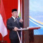 Bupati Aceh Besar H. Muharram Idris menyampaikan sambutan dan arahan pada Pengukuhan LKKS Kabupaten Aceh Besar Masa Bakti 2025–2030 di Meuligoe Bupati Aceh Besar, Kota Jantho, Rabu (16/9/2026). Foto: Dok. MC Aceh Besar