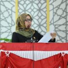 Juru Bicara Fraksi Golkar-PKB-PPP DPRK Banda Aceh, Syarifah Munira, saat menyampaikan pandangan umum fraksi terhadap Rancangan Qanun Perubahan APBK Banda Aceh Tahun Anggaran 2026 dalam rapat paripurna, Selasa (15/9/2026). Foto: Dok. DPRK Banda Aceh