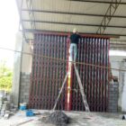 Pekerja melanjutkan pembangunan KDKMP Desa Gunung Suku yang telah mencapai progres 91,68 persen, Jumat (23/10/2026).dok:Ist
